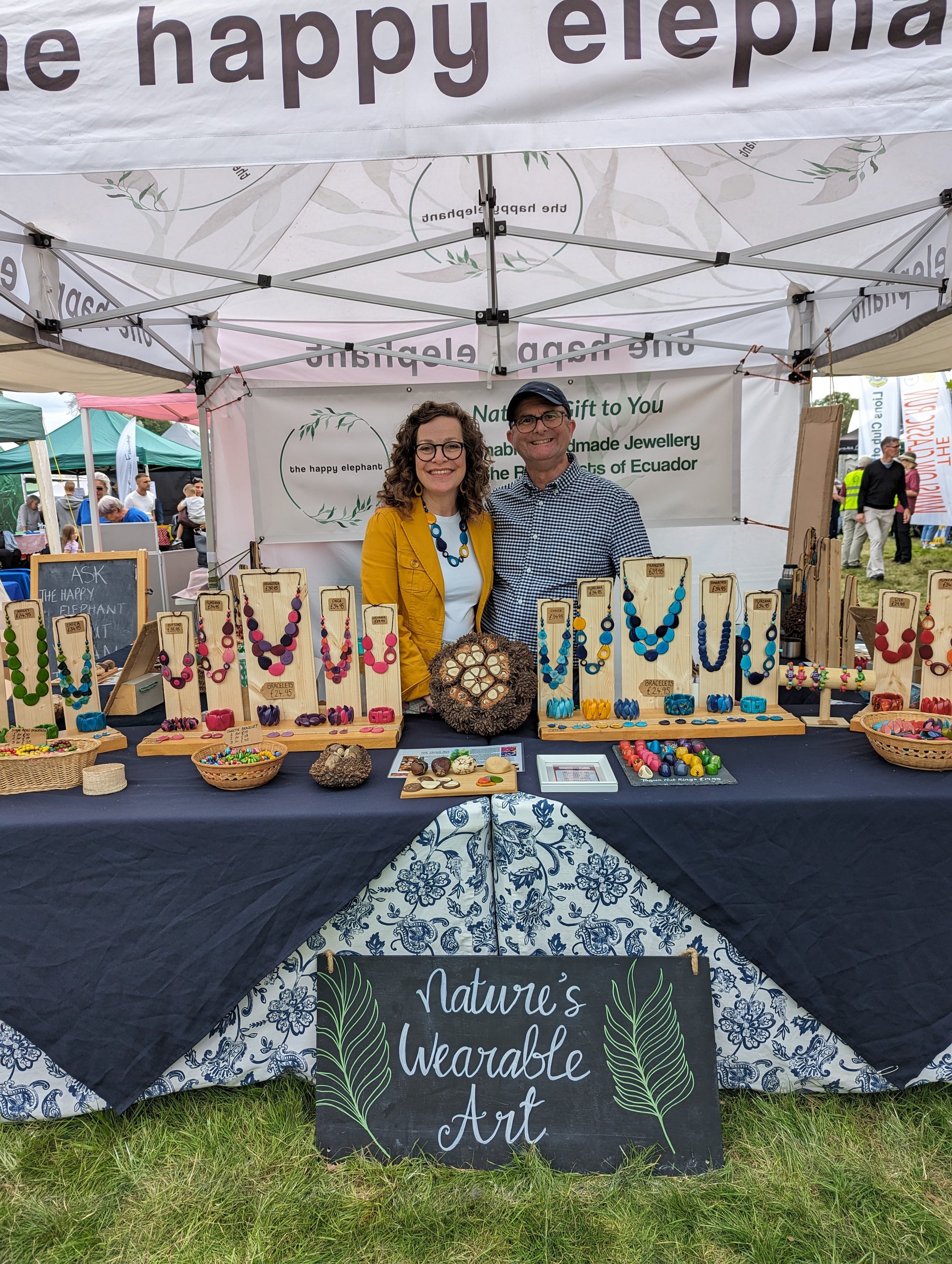 Mark and Alison Williams at their market stall The Happy Elephant selling tagua nut jewellery ery